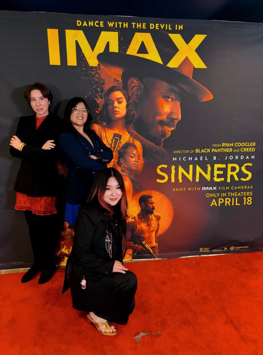 Our podcast team posing at the Sinners premiere